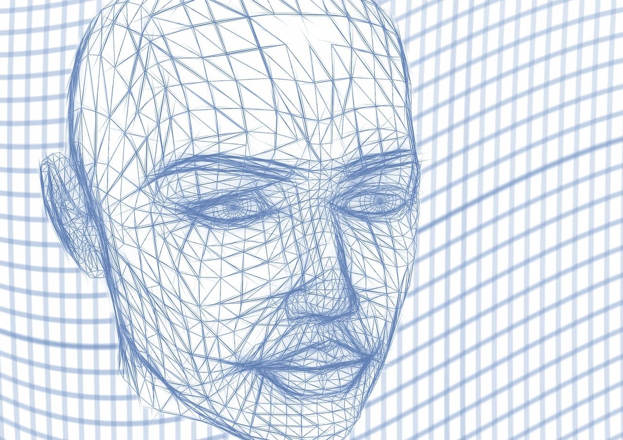 Desenho de uma cabeça humana feita de linhas finas azuis que formam uma malha de triângulos, sobre um fundo branco com uma grade azul.